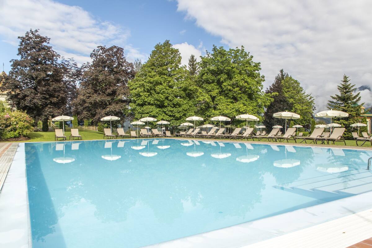 3 indoor pools, seasonal outdoor pool, open 7 am to 7 pm, pool umbrellas