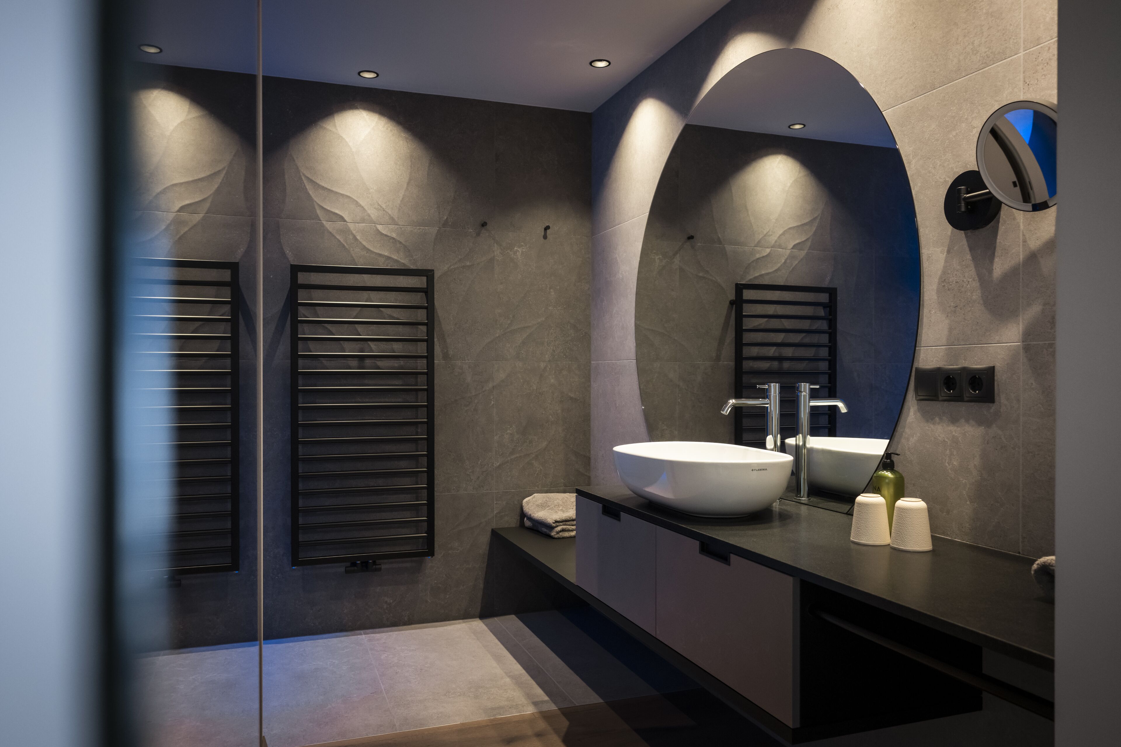 junior suite | bathroom | shower, rainfall showerhead, hair dryer, bathrobes