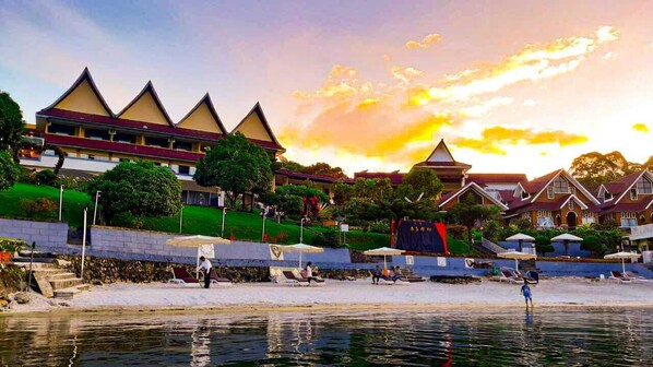 Private beach, white sand, beach shuttle, beach bar