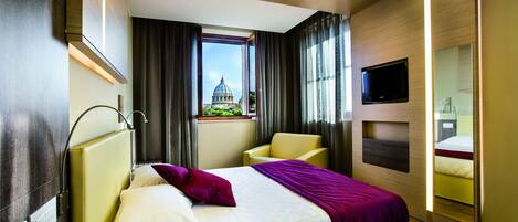 A modern hotel room with a bed, a chair, a TV, and a window with a view of a dome structure.