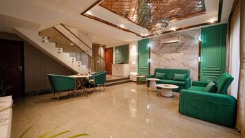 Deluxe Villa | Living area | LCD TV