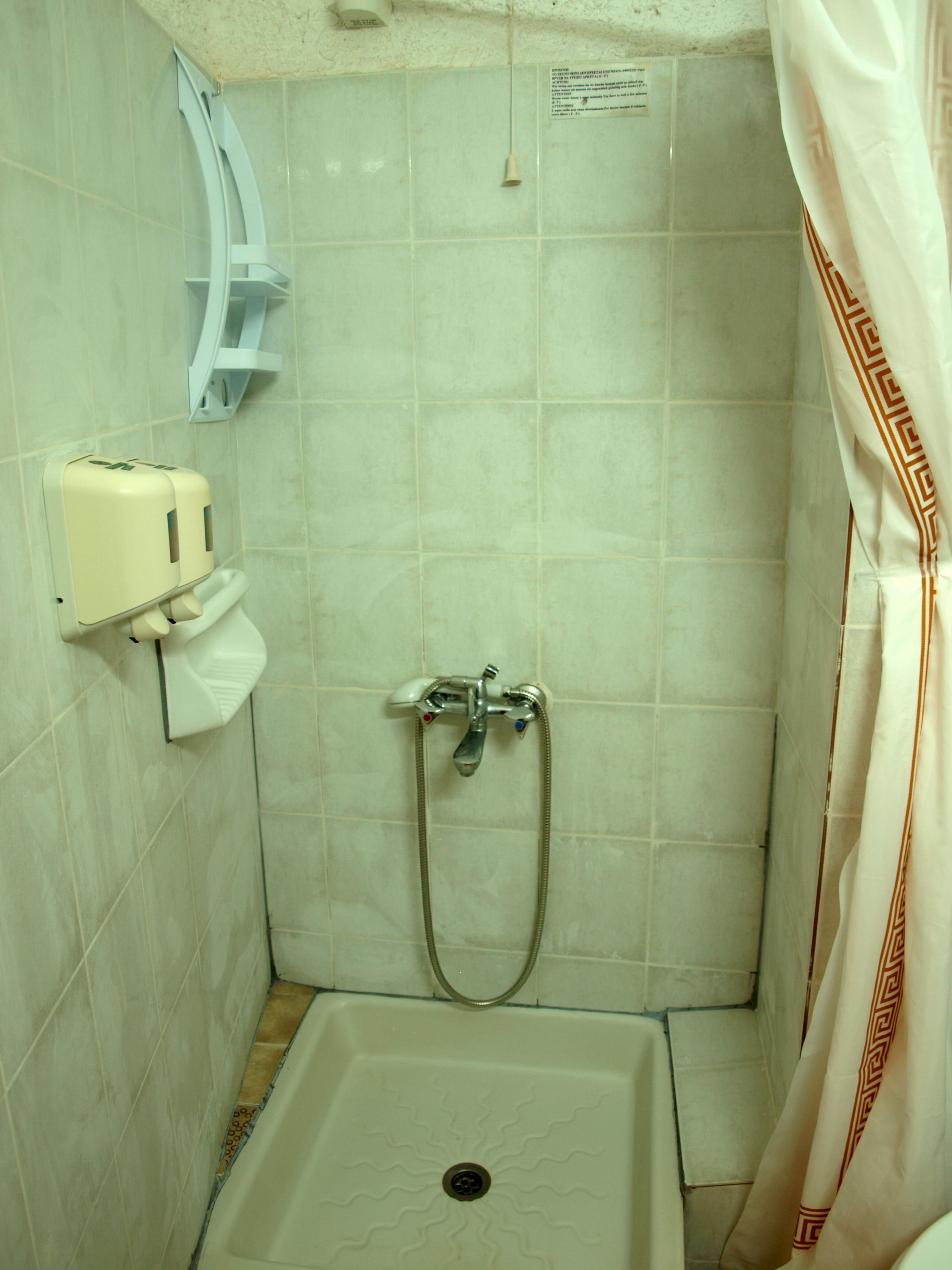 basic double room | bathroom | shower, hair dryer, towels