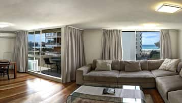 Premium Apartment, 2 Bedrooms, Ocean View | Living area | 42-inch flat-screen TV with premium TV channels, LED TV, DVD player