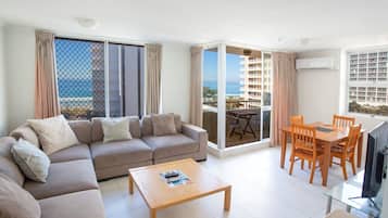 Standard Apartment, 2 Bedrooms, Ocean View | Living area | 42-inch flat-screen TV with premium TV channels, LED TV, DVD player