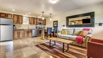 Televisión de pantalla plana de 50 pulgadas con canales por cable