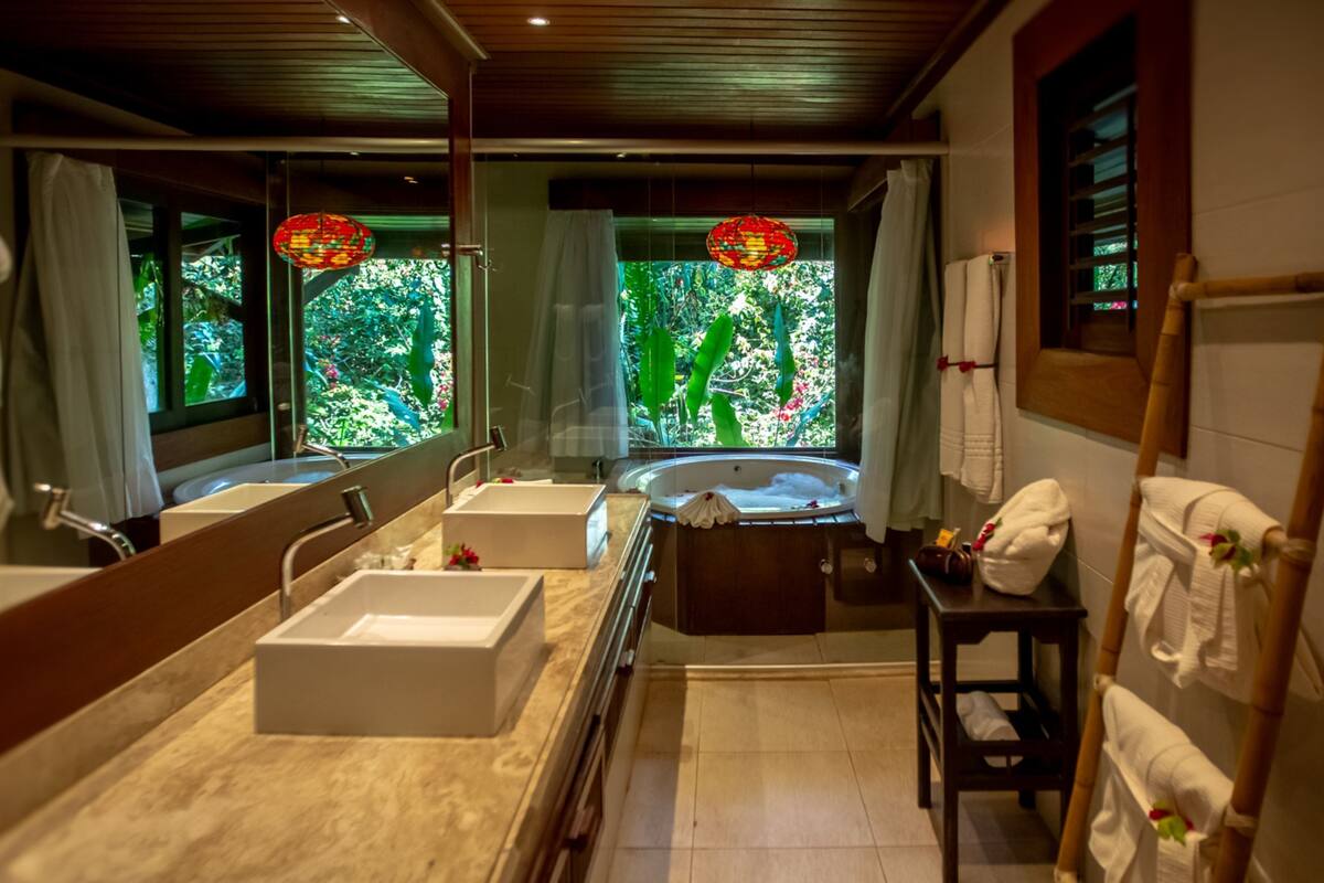 premium suite, hot tub | bathroom | shower, bathrobes, towels