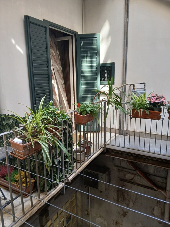 Chambre quadruple Prestige | Terrasse/patio