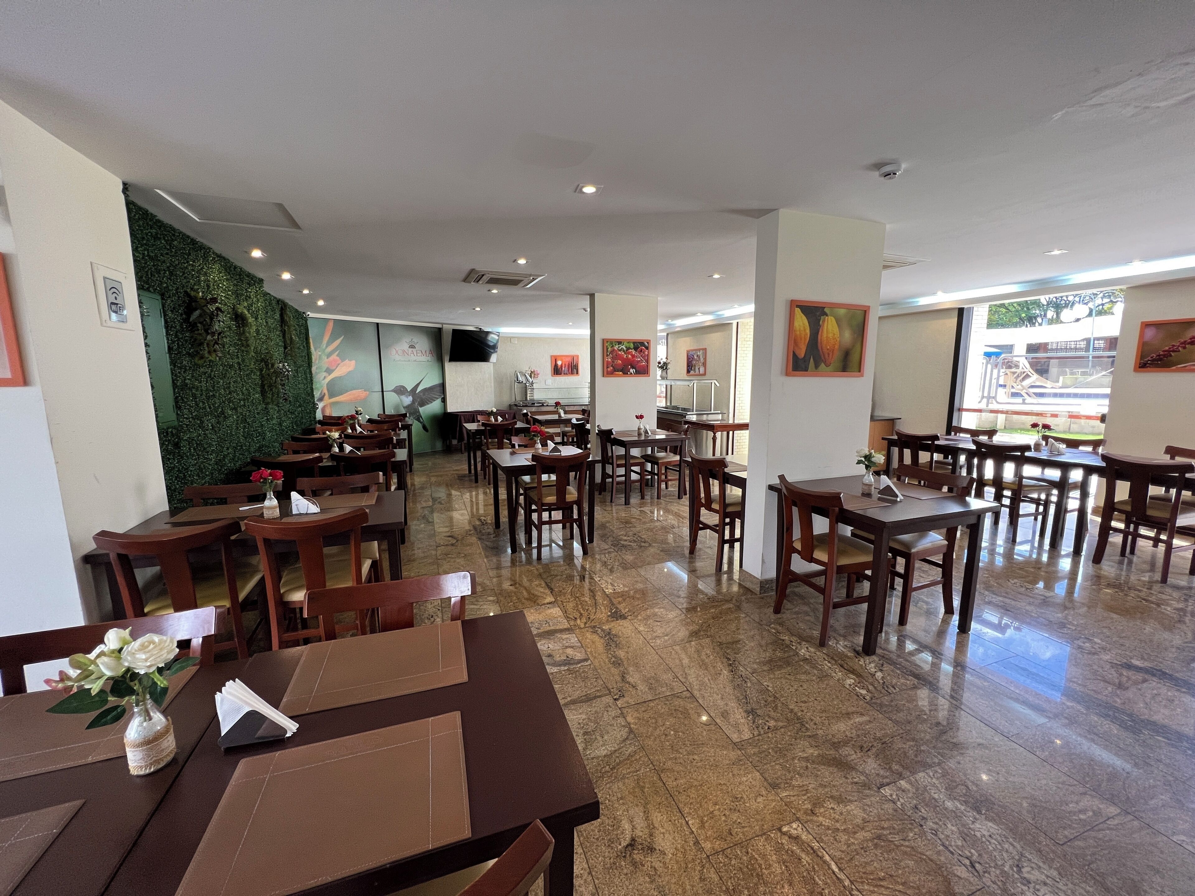 Breakfast, lunch, dinner served; international cuisine, pool views 