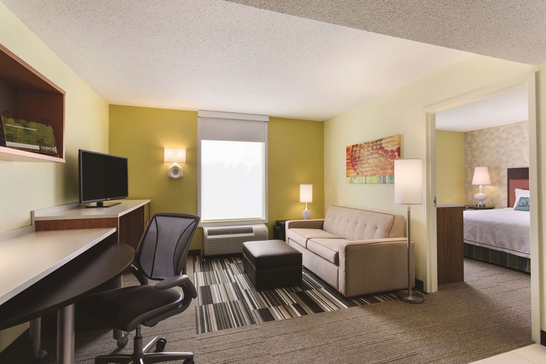 Premium bedding, pillow-top beds, desk, laptop workspace