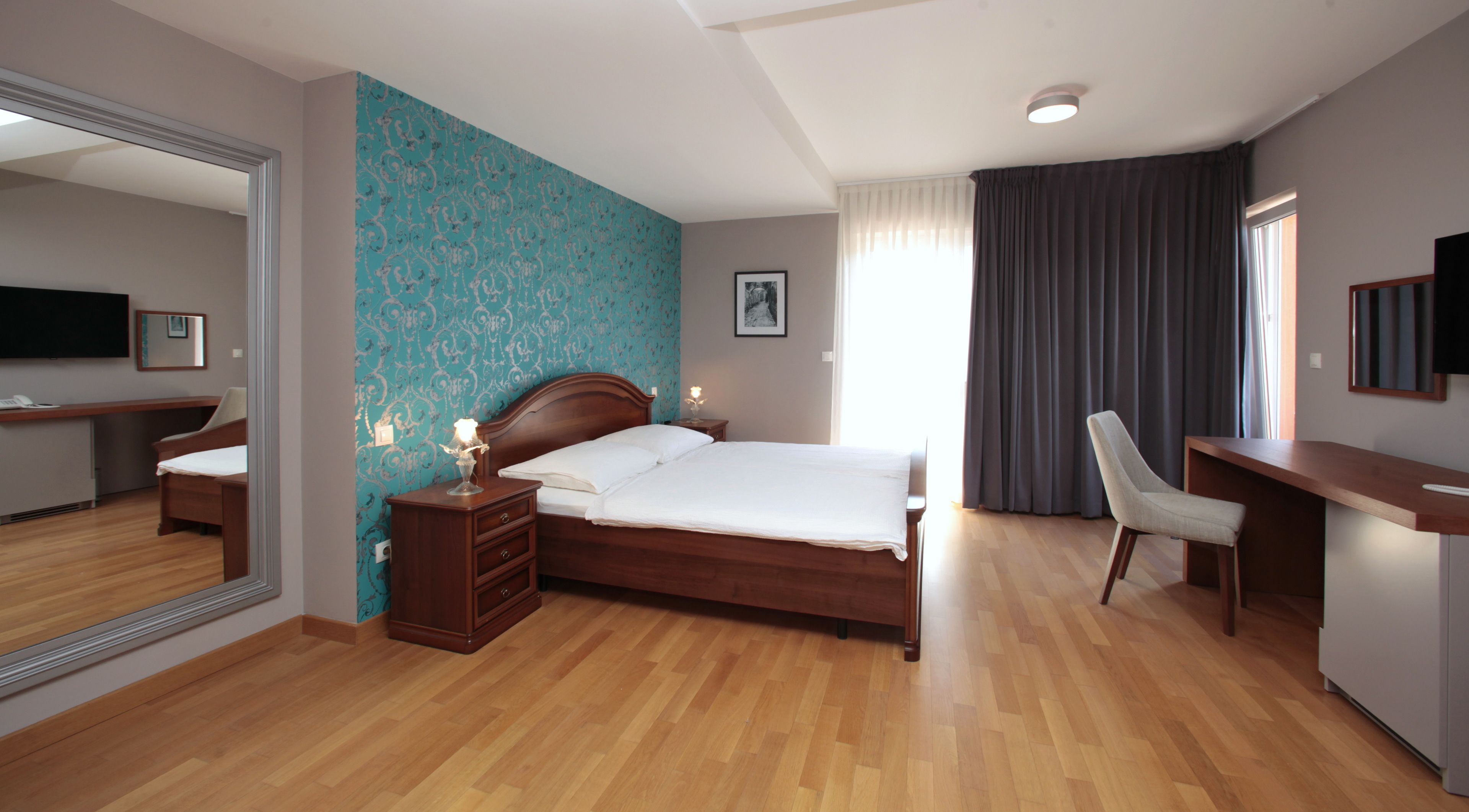 comfort double room | 1 bedroom, minibar, in-room safe, blackout curtains