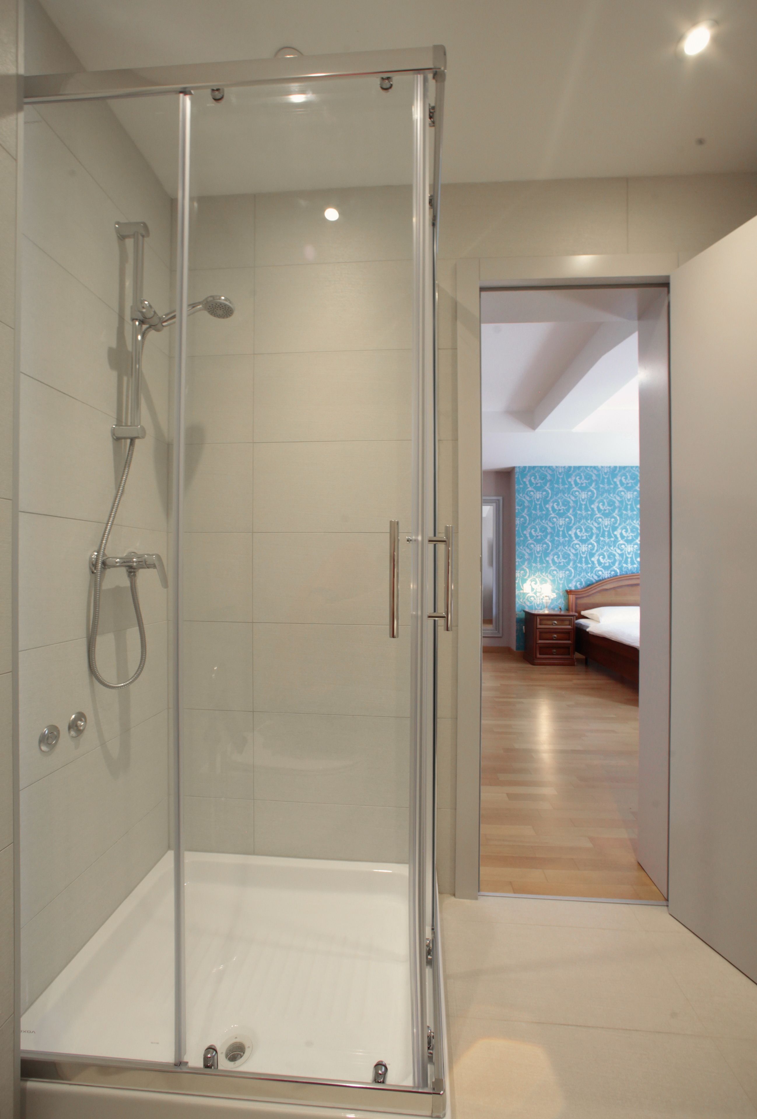 comfort double room | bathroom | designer toiletries, hair dryer, towels