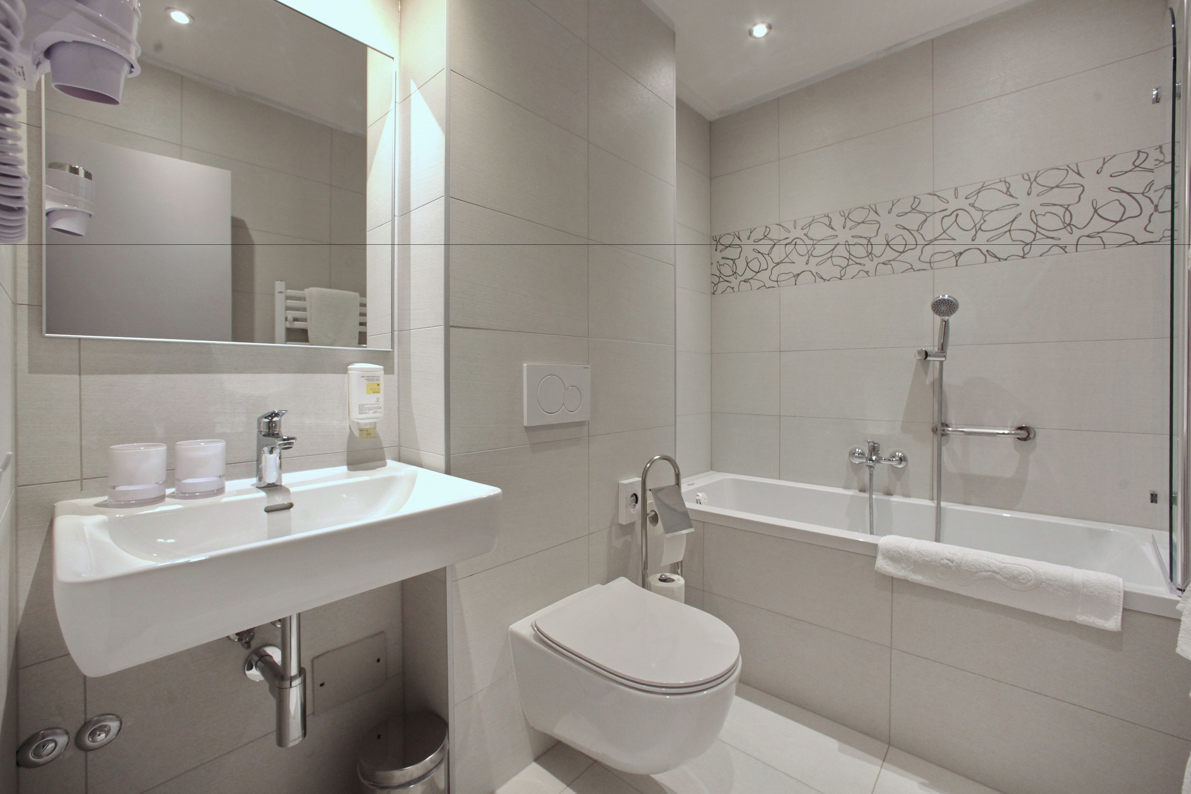 comfort double room | bathroom | designer toiletries, hair dryer, towels