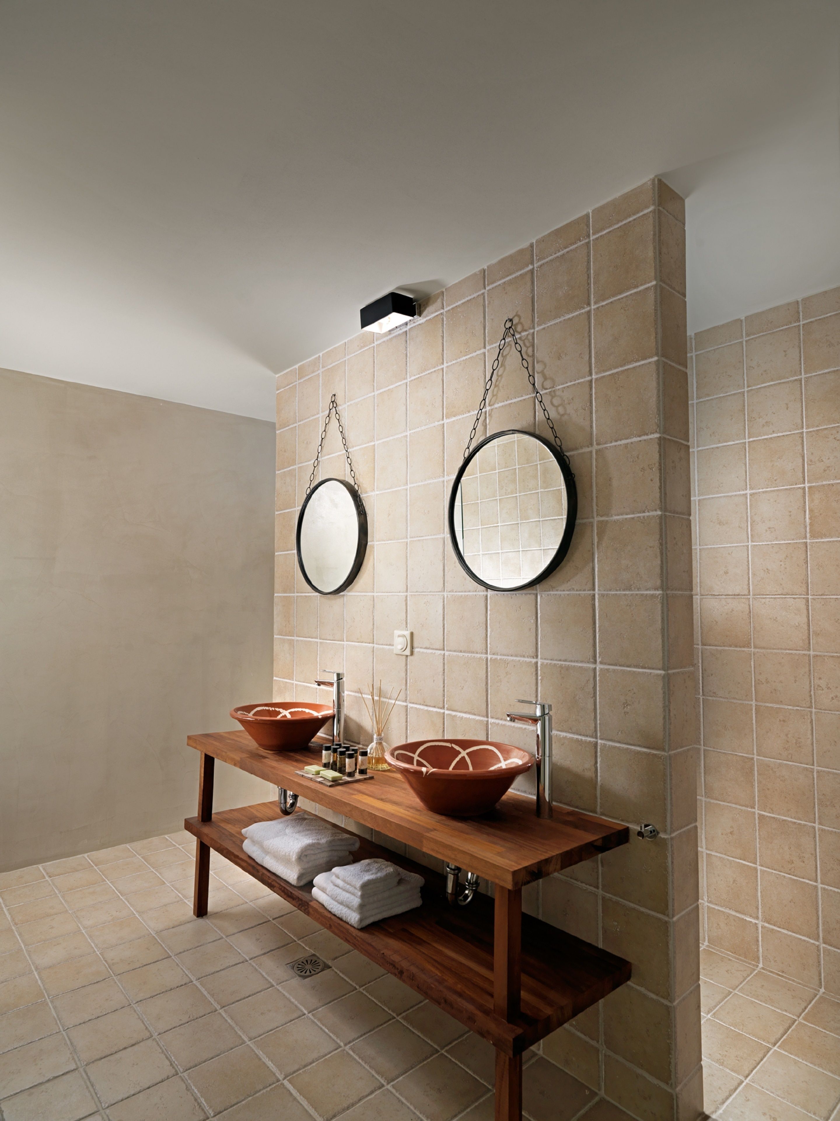 designer toiletries, hair dryer, bathrobes, slippers