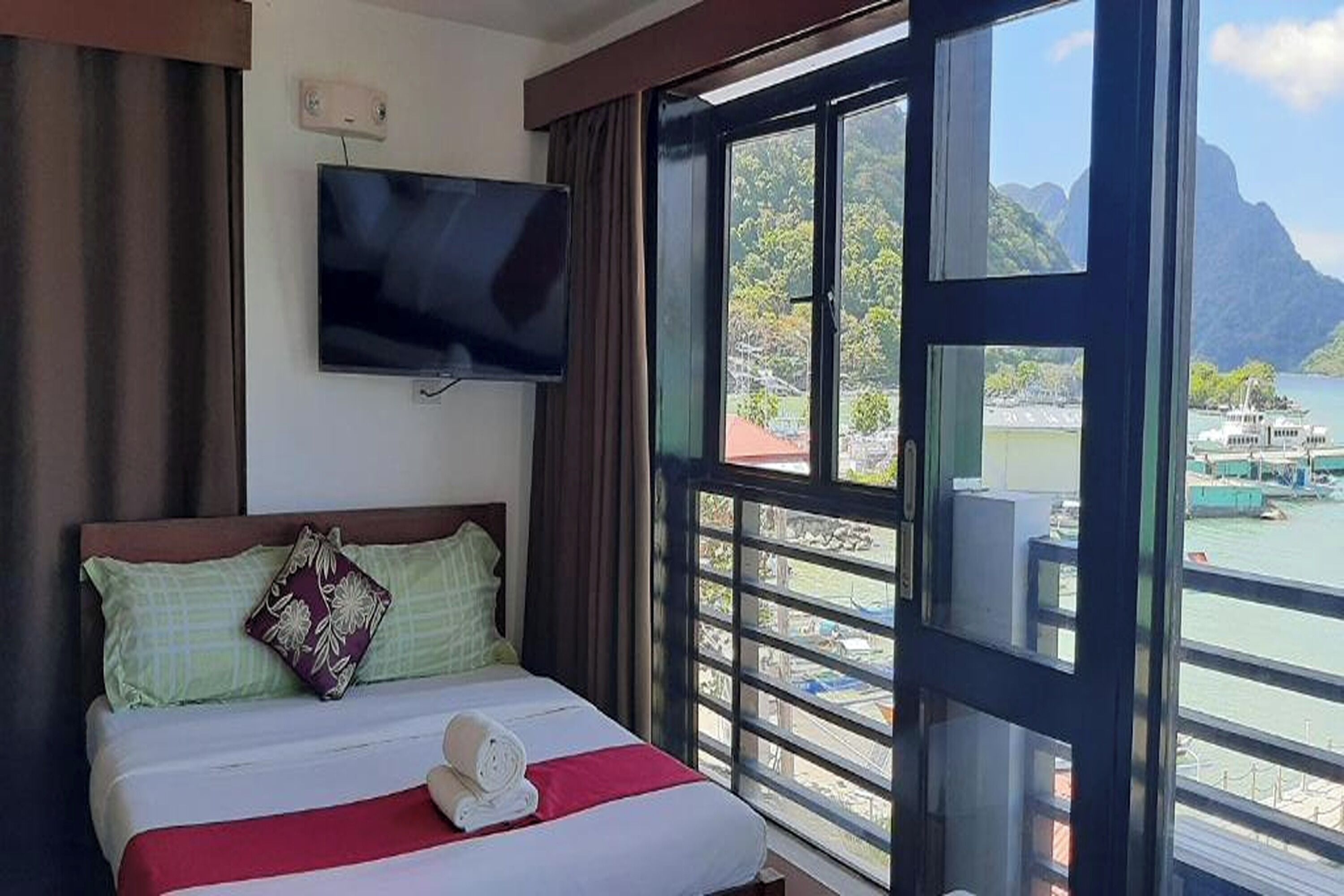 Family Room, Sea View | Desk, blackout curtains, iron/ironing board, rollaway beds