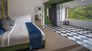 A modern bedroom with a bed, checkered floor, a large window with a view, and a green accent wall.