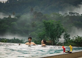 Outdoor pool, open 8:00 AM to 6:00 PM, pool umbrellas