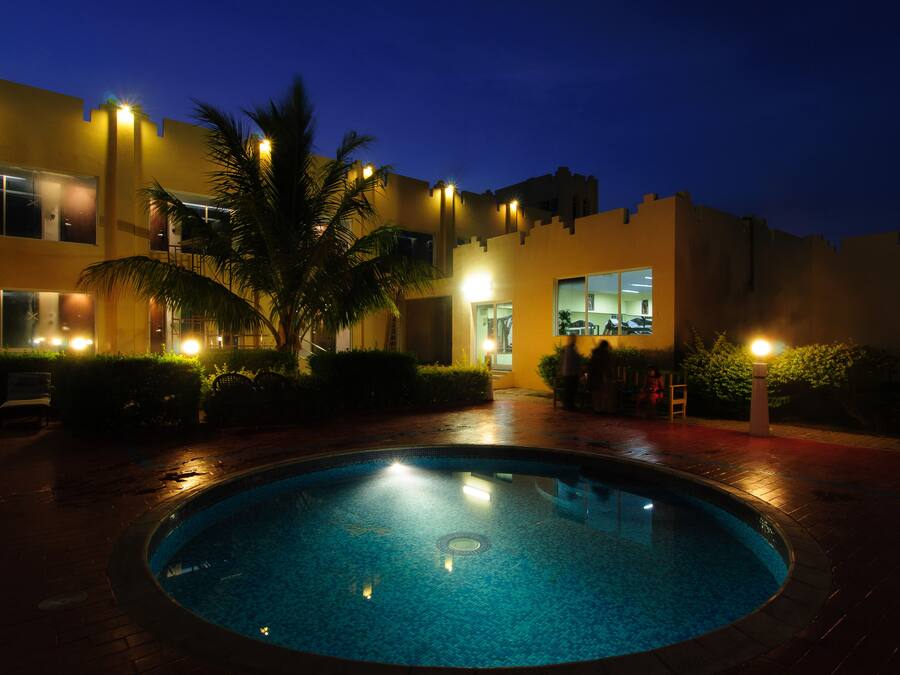 Seasonal outdoor pool, pool umbrellas