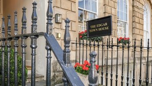 A wrought iron gate with a sign reading "The Edgar Town House." - Edgar Townhouse (Bath)