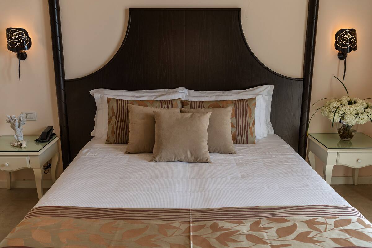Premium bedding, down duvets, in-room safe, desk
