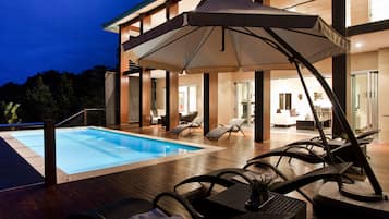 Outdoor pool, pool umbrellas, pool loungers