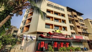 A multi-story building with the name "Krishna Avtar" on the facade. - Krishna Avatar Stay Inn (Navi Mumbai)