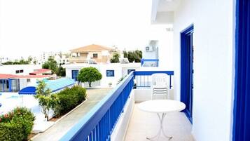 Basic Apartment, 1 Bedroom, Pool View | 1 bedroom, in-room safe, soundproofing, iron/ironing board