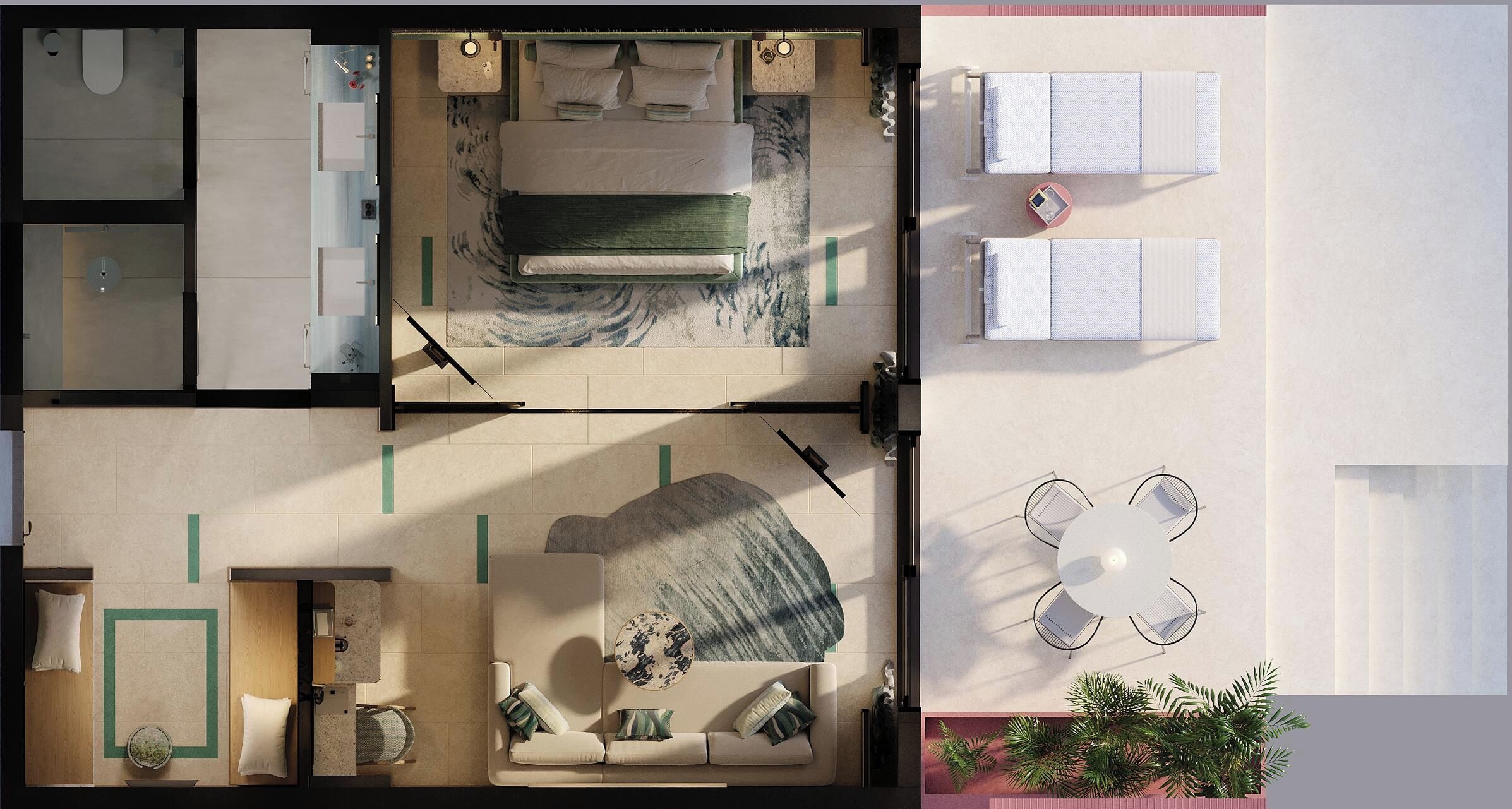 A hotel room with a bed, a sitting area with a table and chairs, a small kitchen area, and a bathroom.