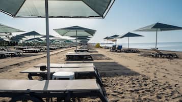 Private beach, sun loungers, beach umbrellas, beach towels