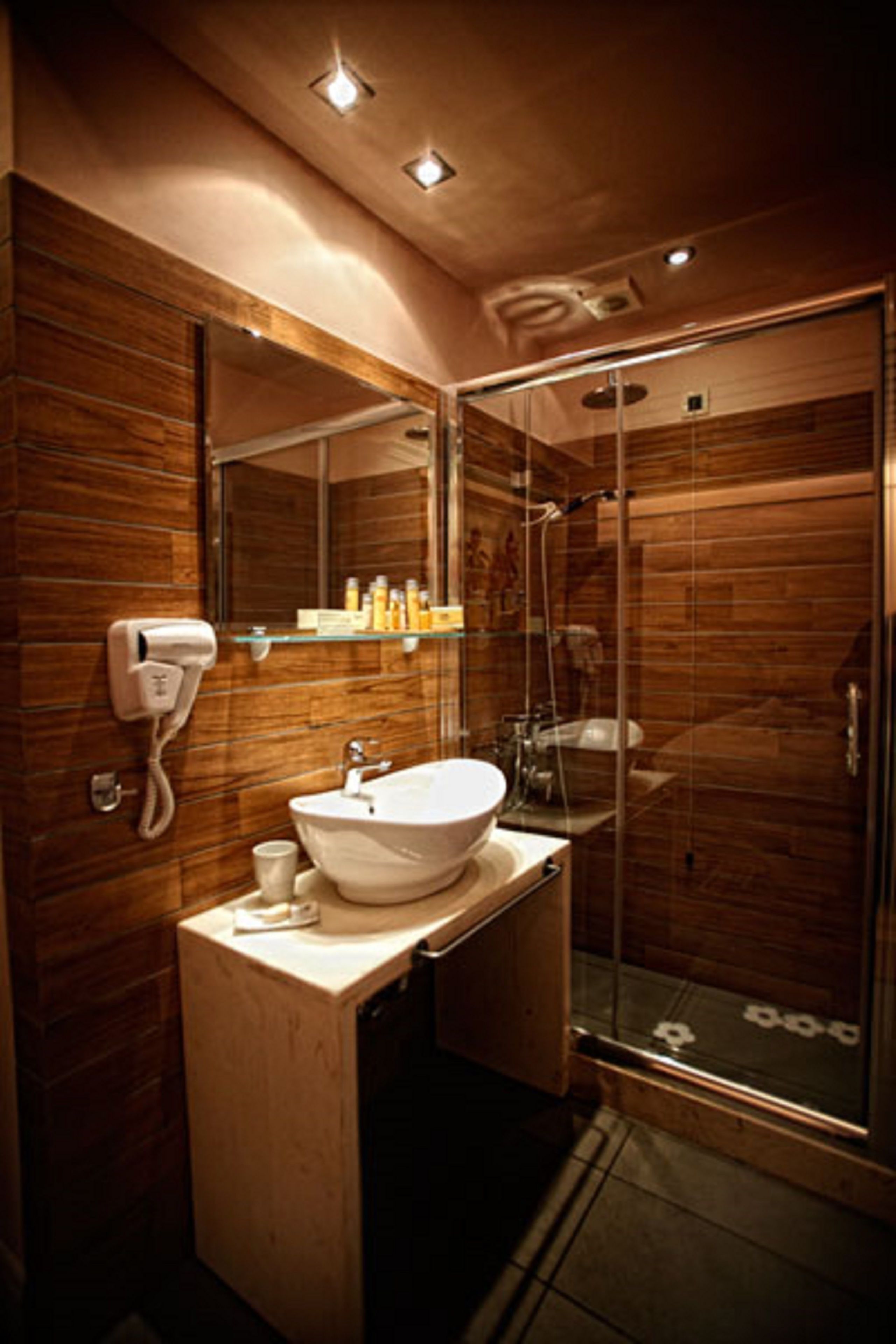 design room, fireplace, mountain view | bathroom | shower, free toiletries, hair dryer, slippers