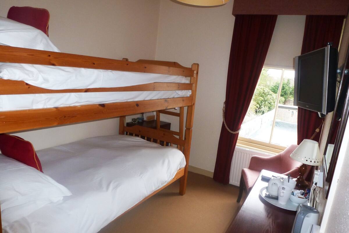 Family Room | Egyptian cotton sheets, in-room safe, iron/ironing board, free WiFi