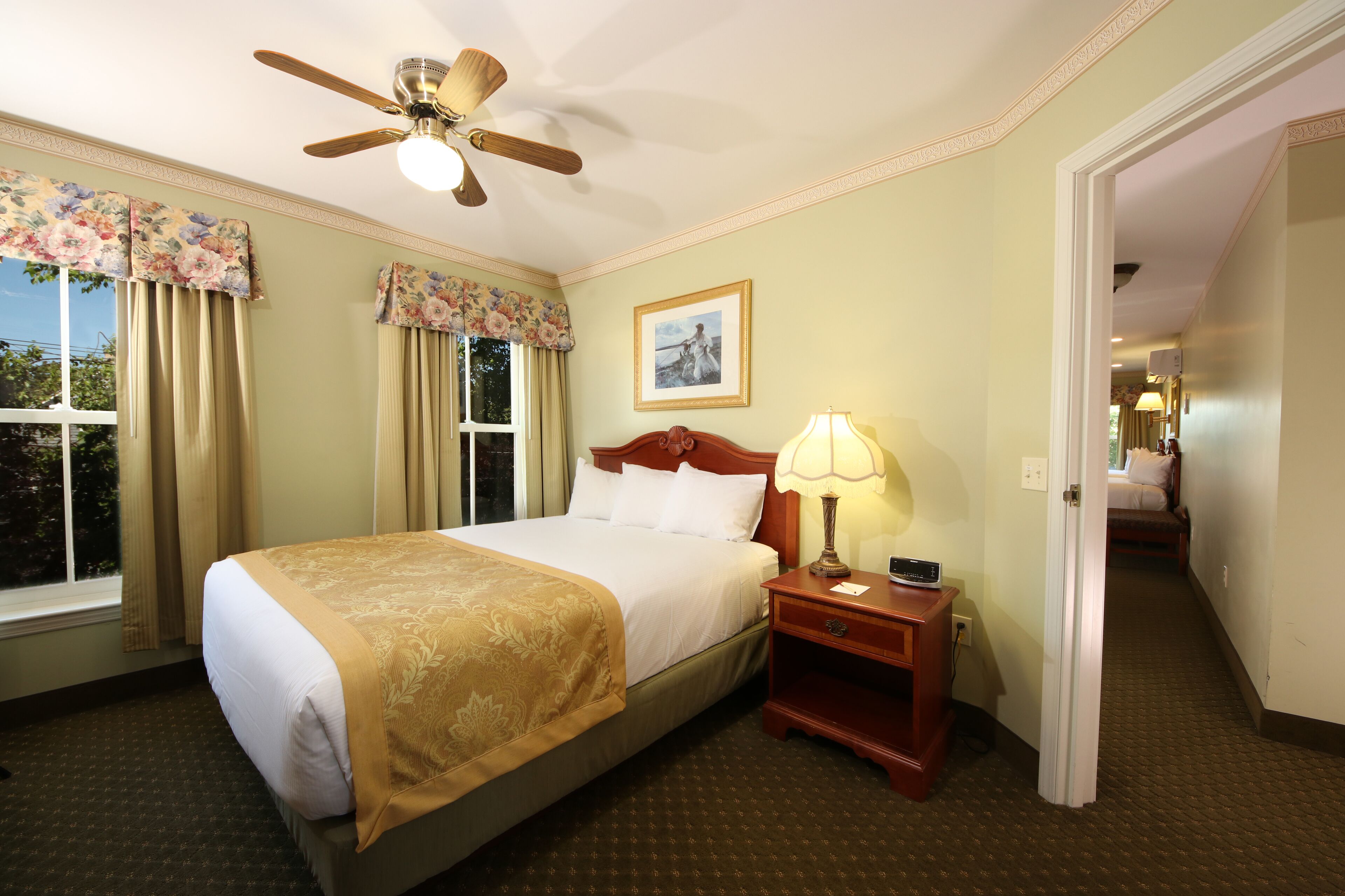 family room, 2 bedrooms | premium bedding, blackout curtains, iron/ironing board