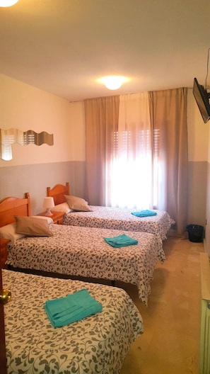 Triple Room, Shared Bathroom | Free WiFi