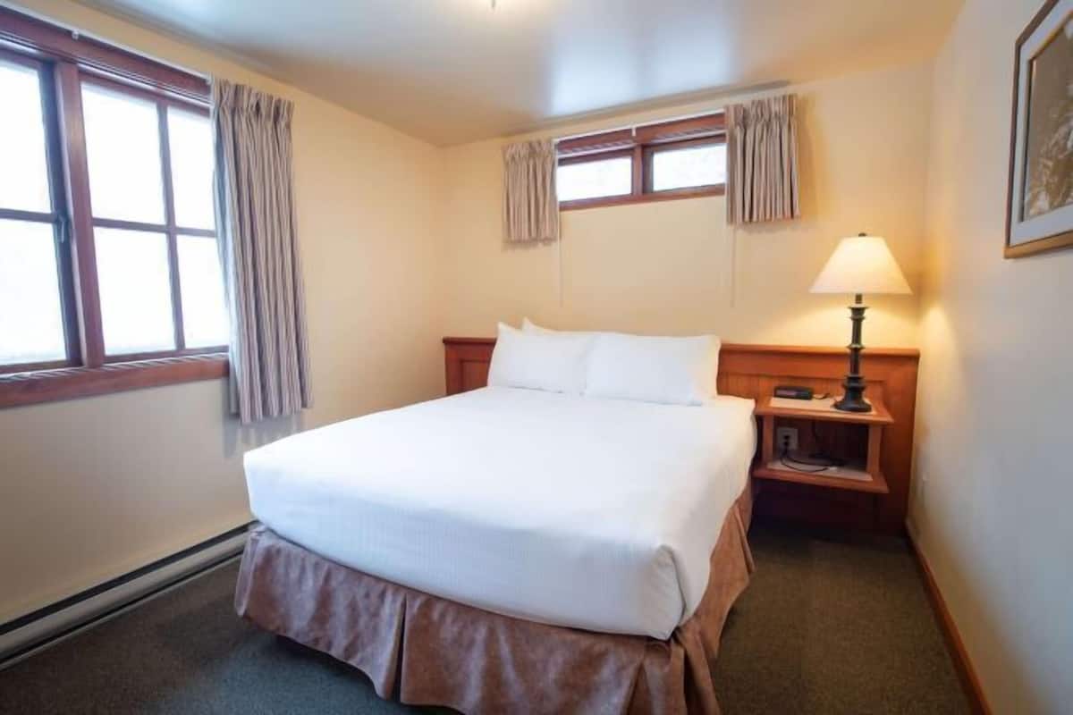 Individually furnished, desk, laptop workspace, iron/ironing board