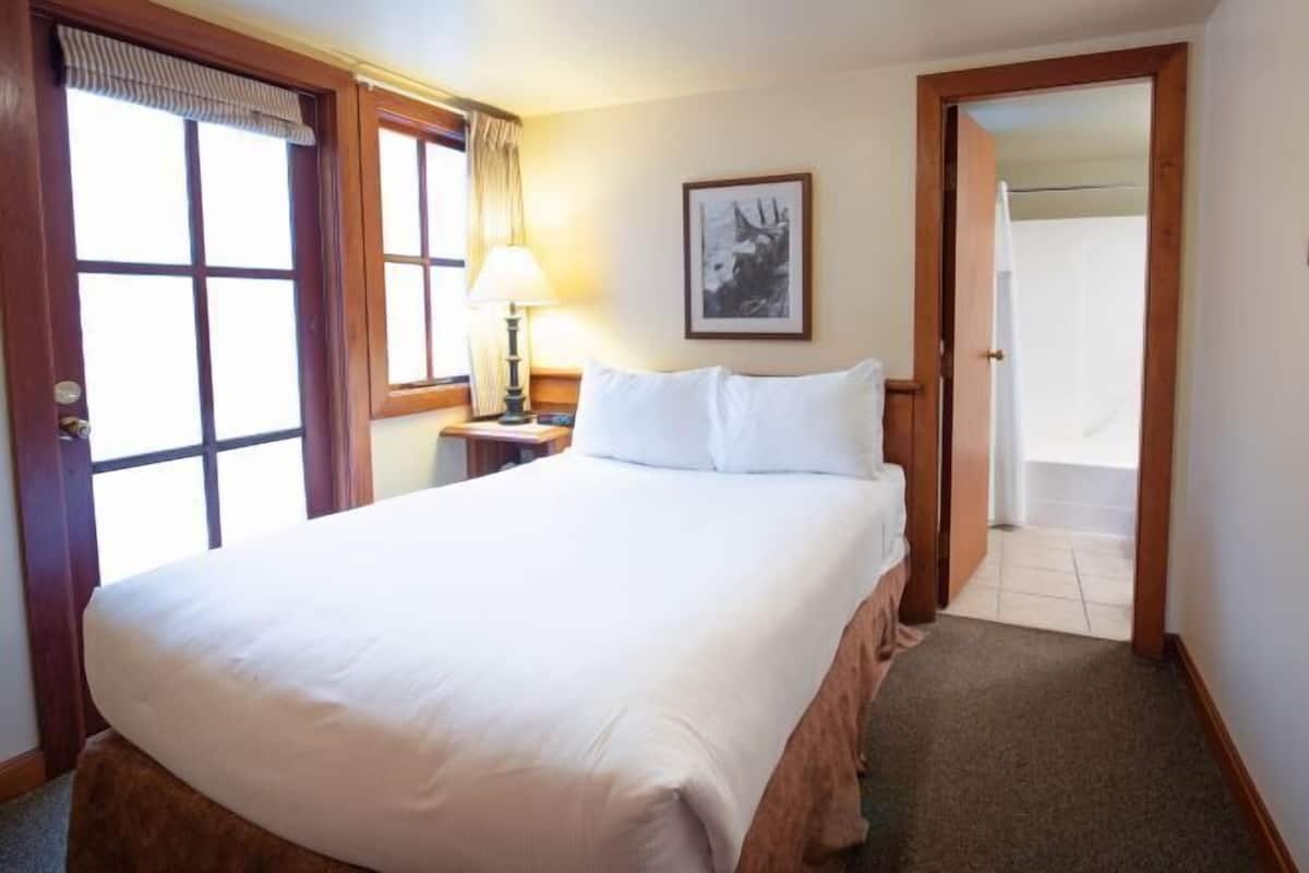 Individually furnished, desk, laptop workspace, iron/ironing board