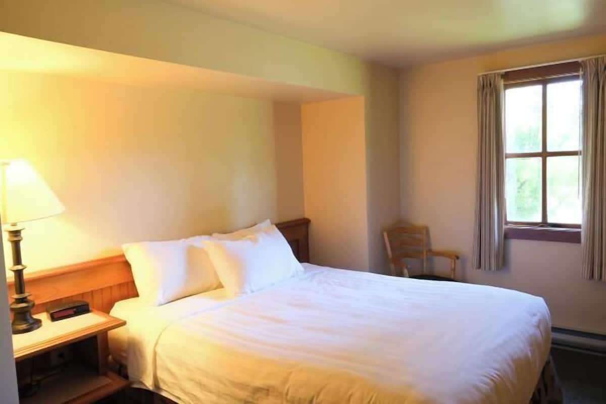 Individually furnished, desk, laptop workspace, iron/ironing board