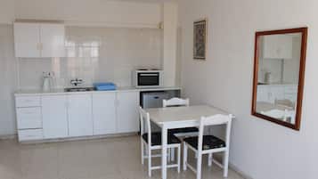 Mini-fridge, coffee/tea maker, electric kettle, cookware/dishes/utensils
