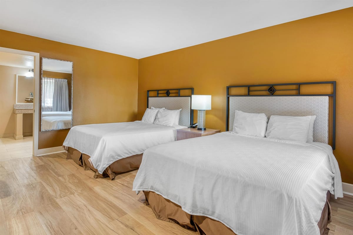 Individually furnished, desk, laptop workspace, iron/ironing board