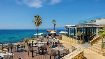 Breakfast, lunch, dinner served; Mediterranean cuisine, pool views