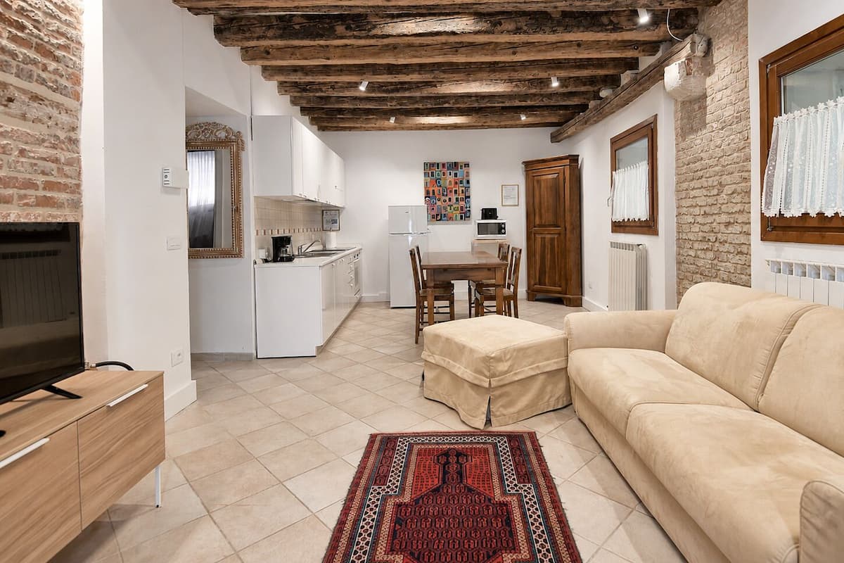 Apartment, 1 Bedroom (Calle de la Testa) | Living area | 30-inch flat-screen TV with digital channels, TV, DVD player