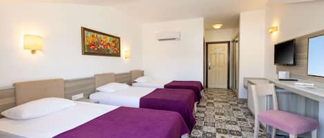 Premium bedding, free minibar, in-room safe, desk