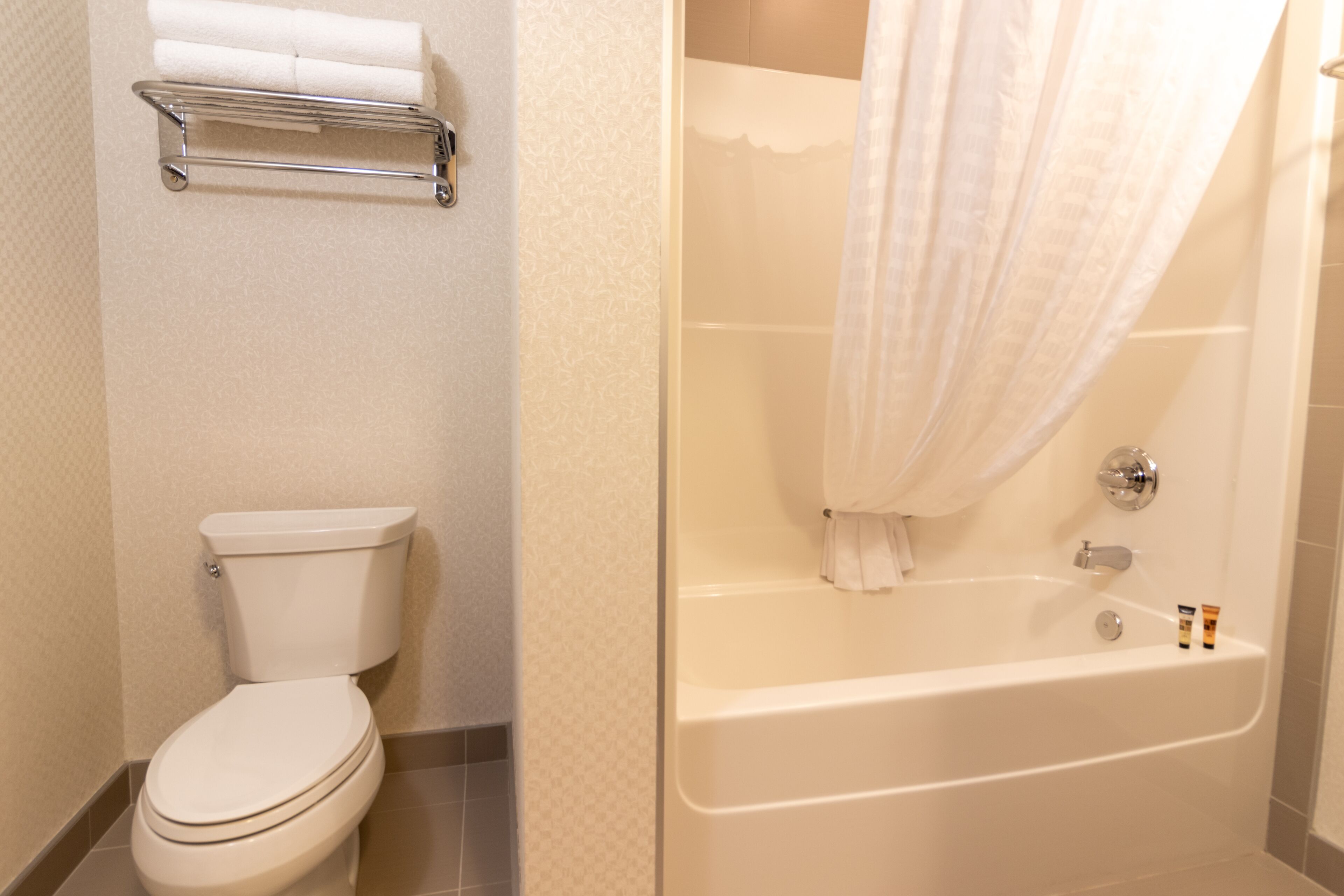 combined shower/bathtub, deep-soaking bathtub, free toiletries