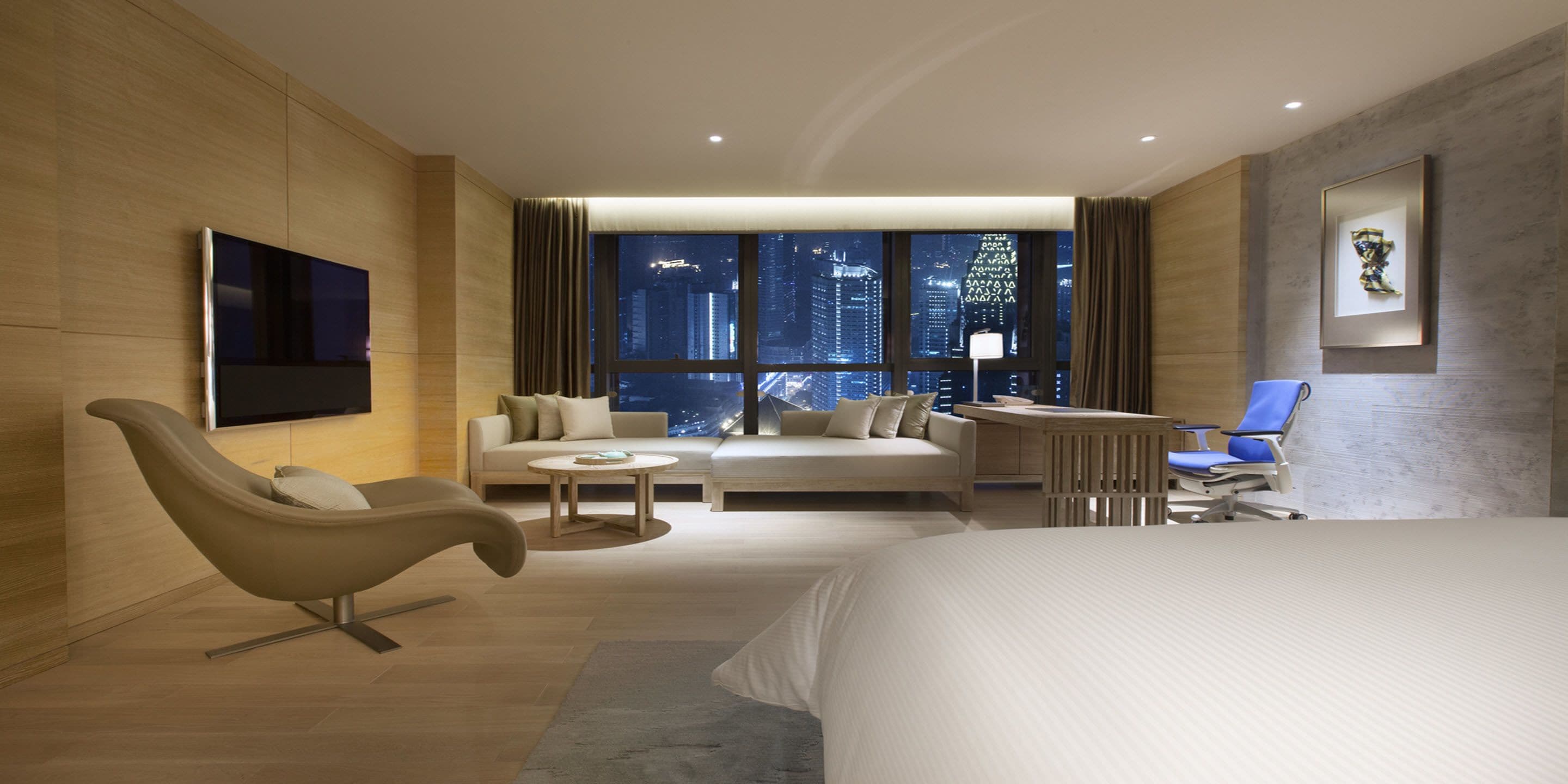 Premium bedding, down comforters, memory foam beds, minibar