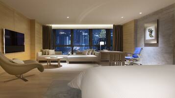 Premium bedding, down comforters, memory foam beds, minibar