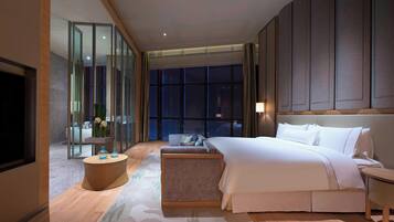 Premium bedding, down comforters, memory foam beds, minibar