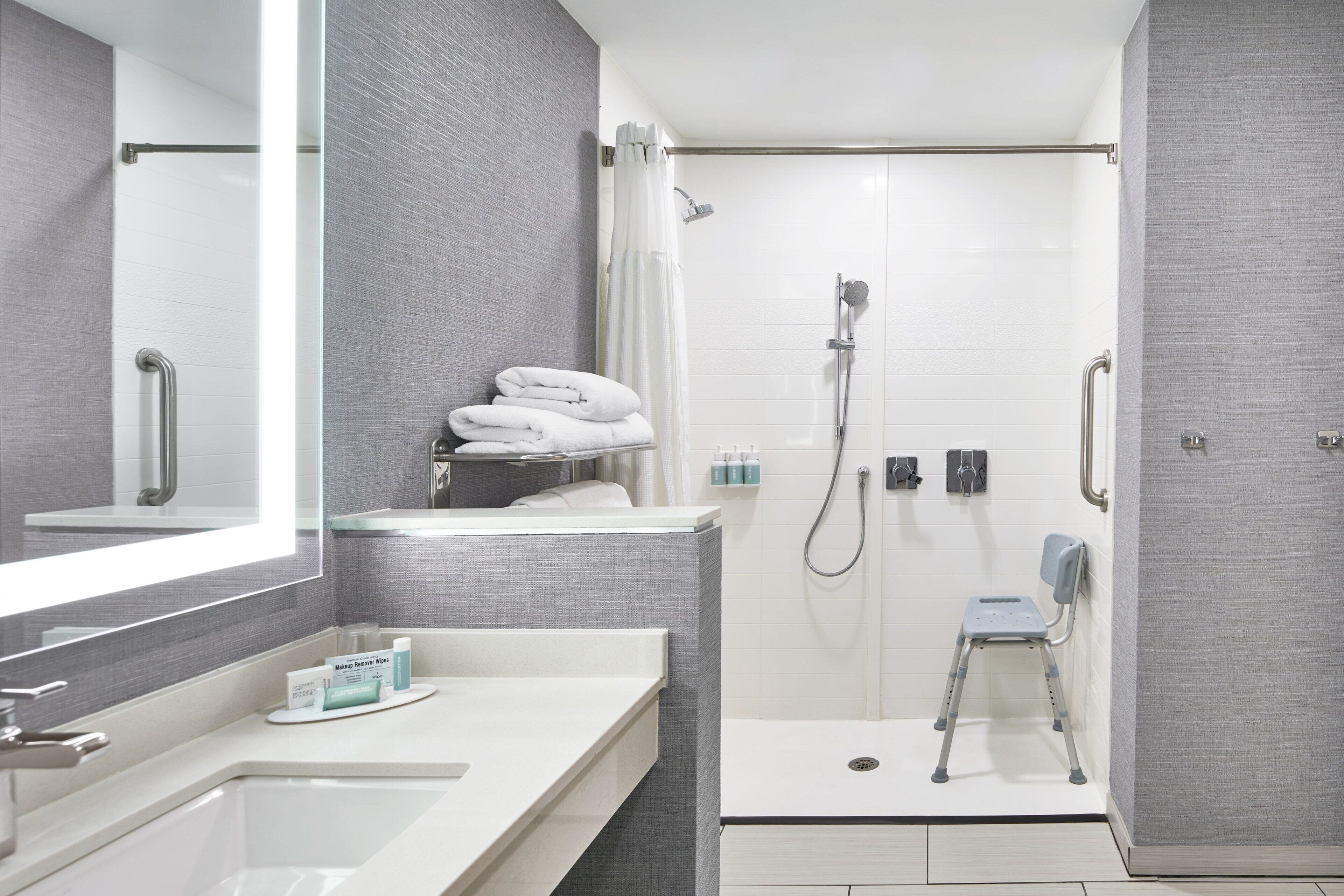 shower, free toiletries, hair dryer, towels