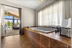 Luxury Studio Suite, Fireplace, Mountain View | Bathroom | Eco-friendly toiletries, hair dryer, towels, soap