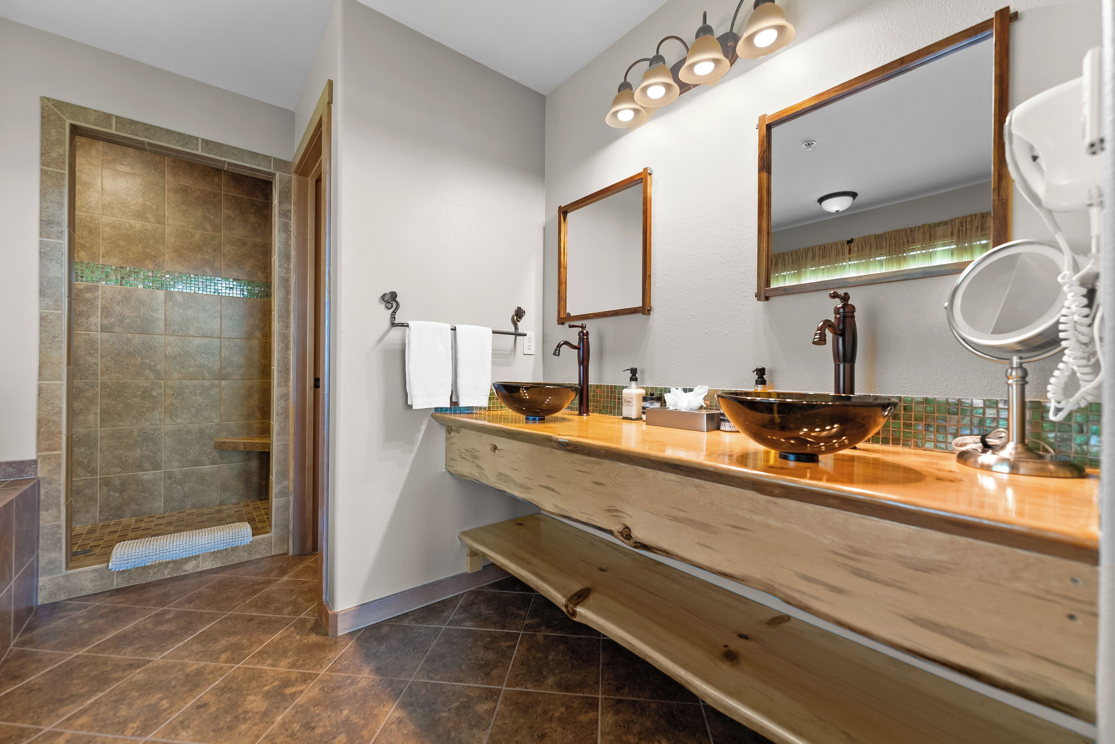 luxury studio suite, fireplace, mountain view | bathroom | eco-friendly toiletries, hair dryer, towels, soap