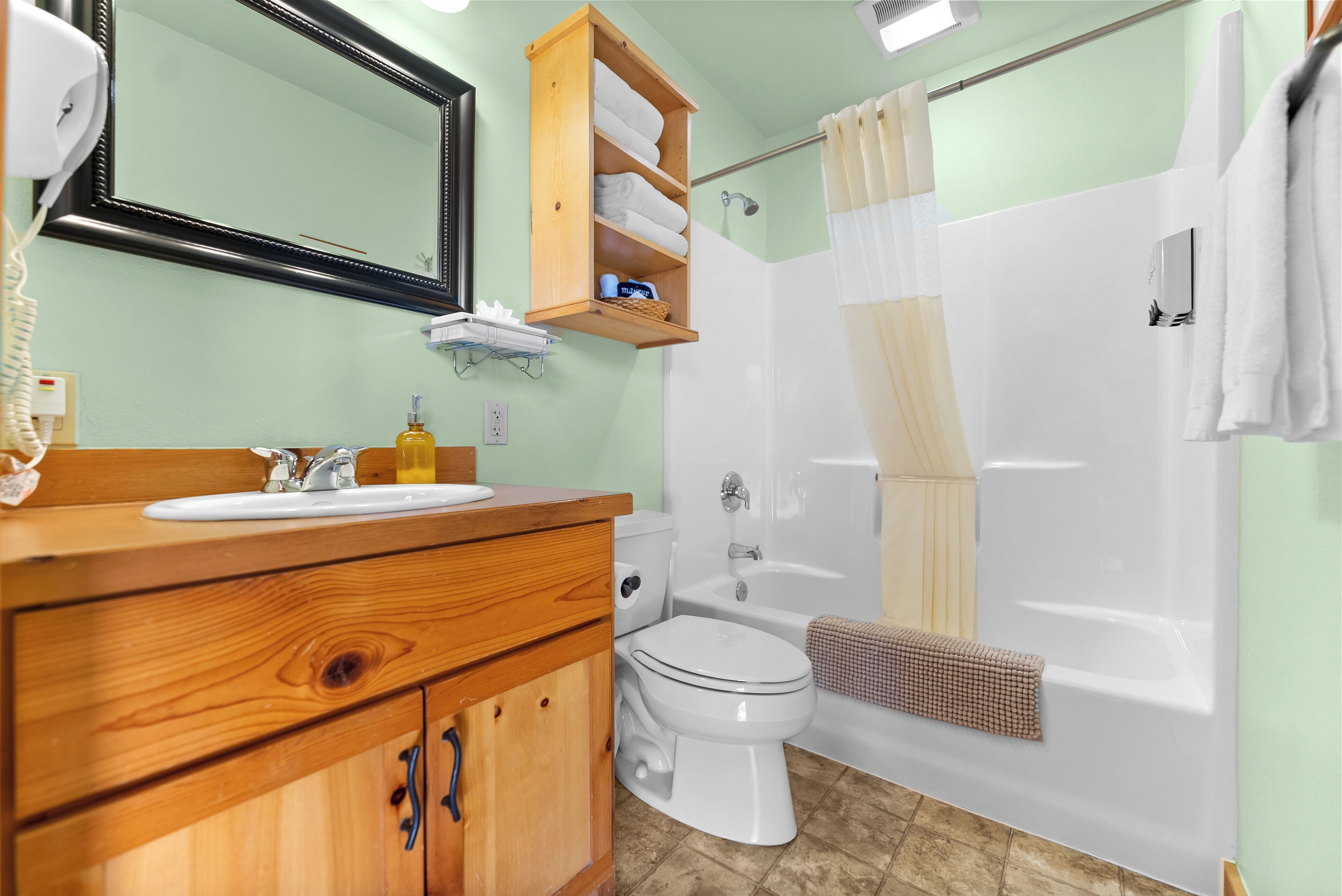 deluxe room, 2 queen beds, valley view | bathroom | eco-friendly toiletries, hair dryer, towels, soap