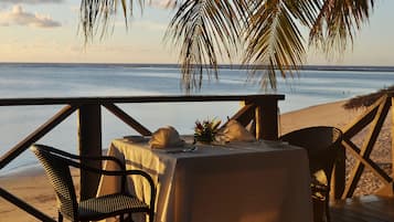Breakfast, lunch, dinner served; beach views