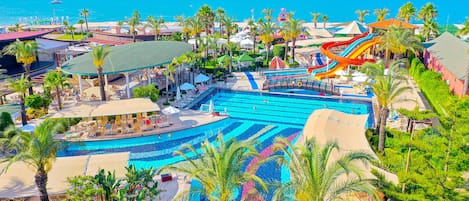 Indoor pool, 3 outdoor pools, open 6:00 AM to 8:00 PM, pool umbrellas